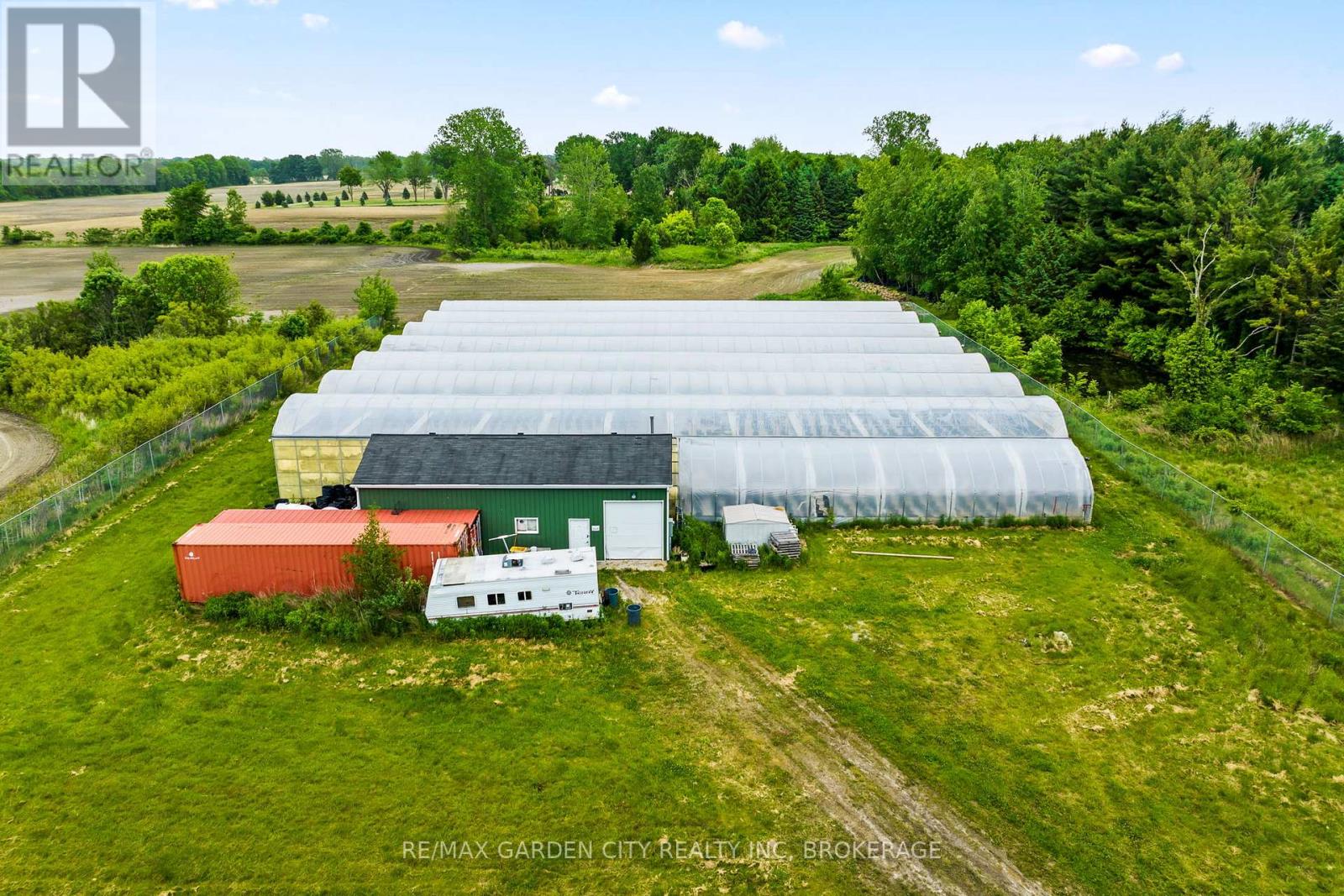 Greenhouse - 53825 Zion Road, Wainfleet, Ontario  L0S 1V0 - Photo 1 - X12933380