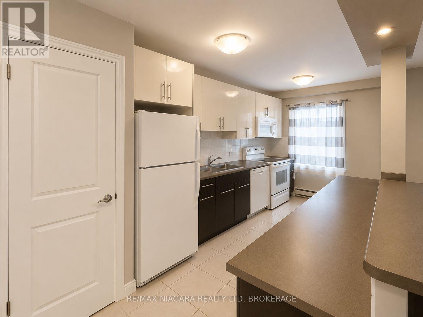 303 - 99 Church Street, St. Catharines, Ontario  L2R 3E1 - Photo 4 - X13685372
